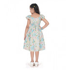 Young girl wearing a premium floral print dress with a satin blue bodice and ruffle sleeves for festive occasions