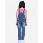Young girl wearing a blue denim dungaree jumpsuit with pink sleeveless top