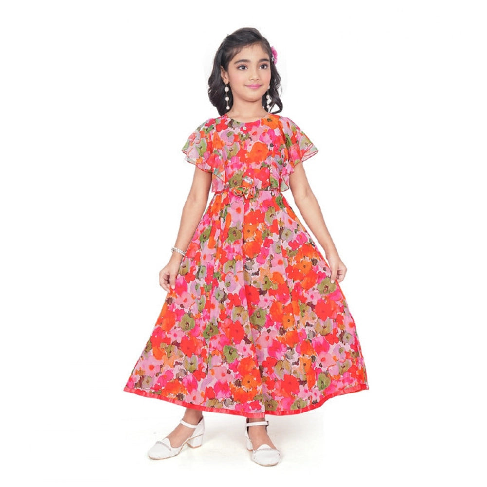 Young girl wearing a vibrant red and pink floral print party wear dress with flutter sleeves