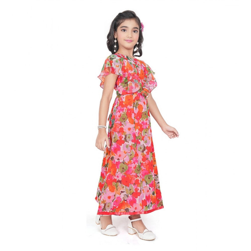 Young girl wearing a vibrant red and pink floral print party wear dress with flutter sleeves