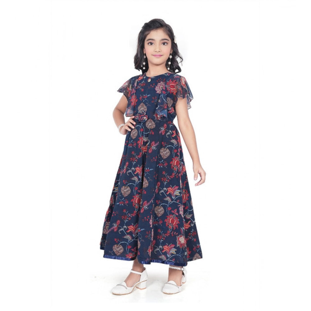 Girl wearing navy blue floral printed maxi dress with flutter sleeves