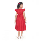 Girl wearing red fit and flare party wear dress with flutter sleeves
