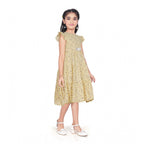 Girl wearing yellow floral party wear dress with cap sleeves